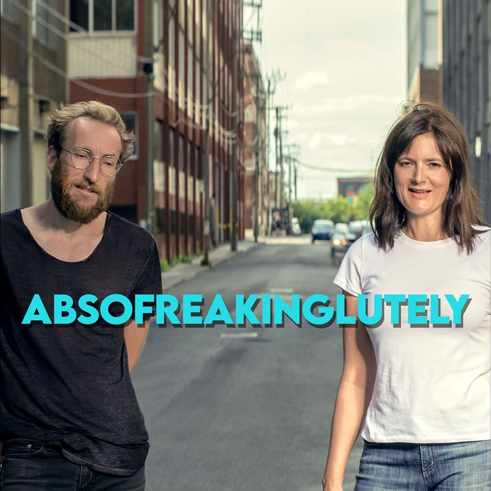 Absofreakinglutely key art — two performers walking down a Montreal alley
